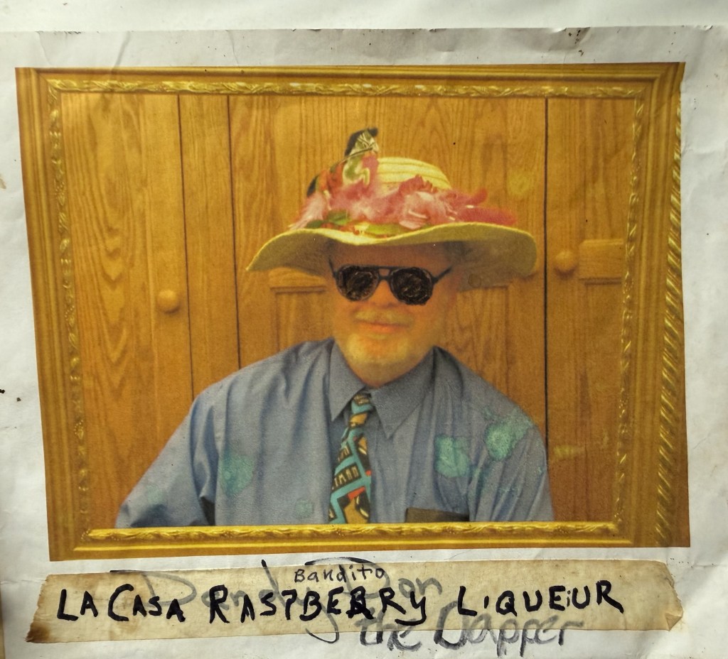 Hand-lettered bottle label for La Casa Raspberry Liqueur.